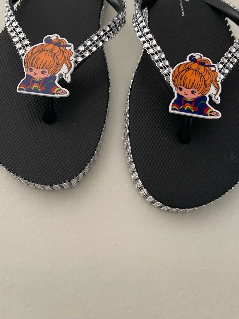 Black Rhinestone Flip Flops with Cartoon Charm